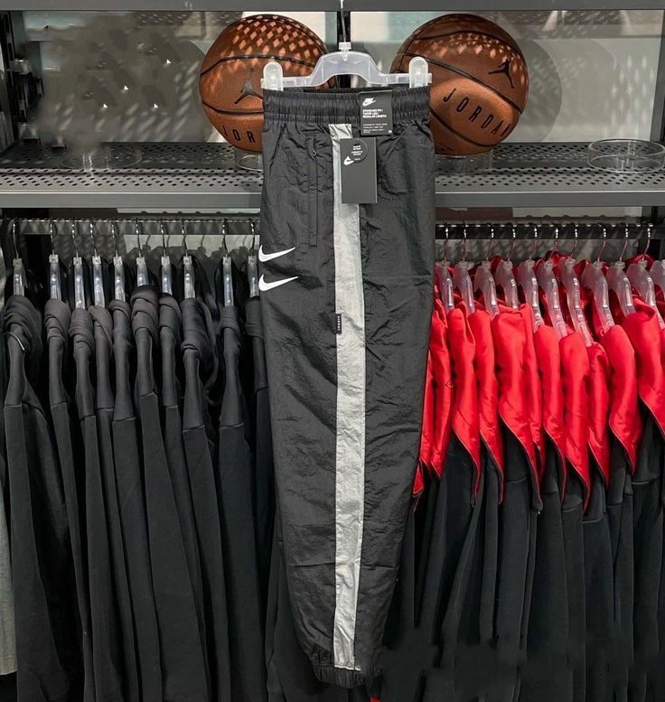 NIKE SPORTSWEAR Swoosh woven pants for men