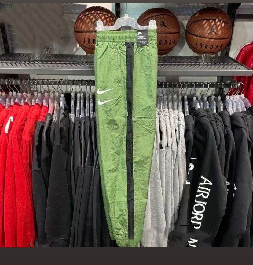 NIKE SPORTSWEAR Swoosh woven pants for men
